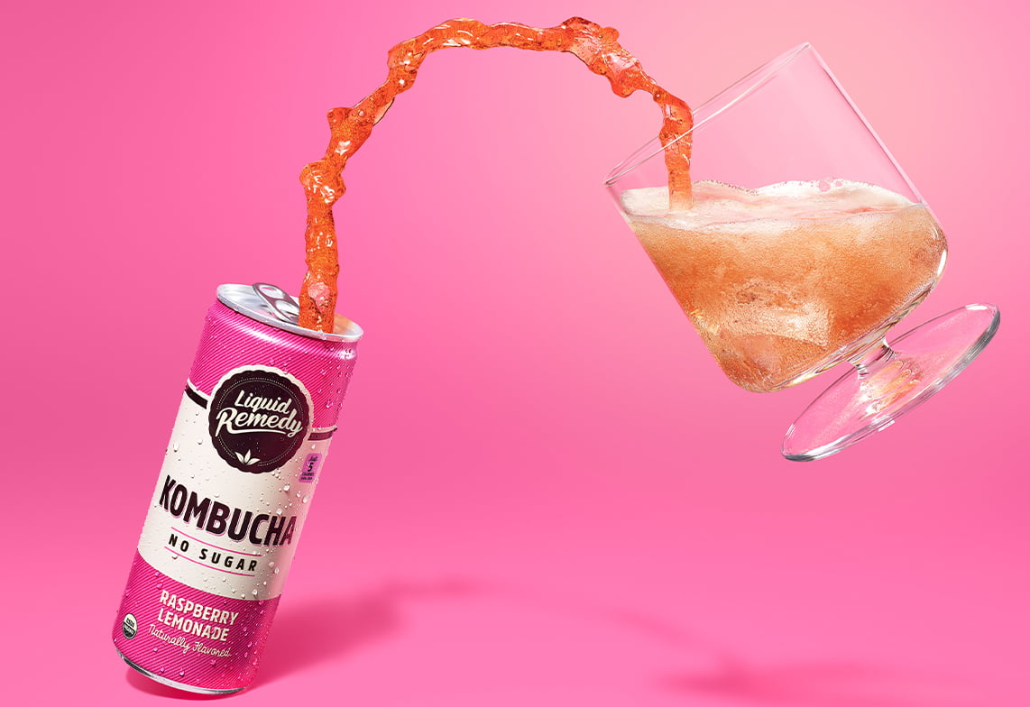 Liquid Remedy Raspberry Lemonade Kombucha Pouring into Glass