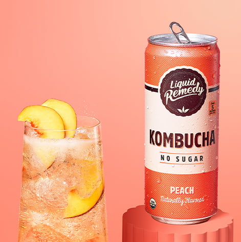 Liquid Remedy Peach Kombucha Can with Glass